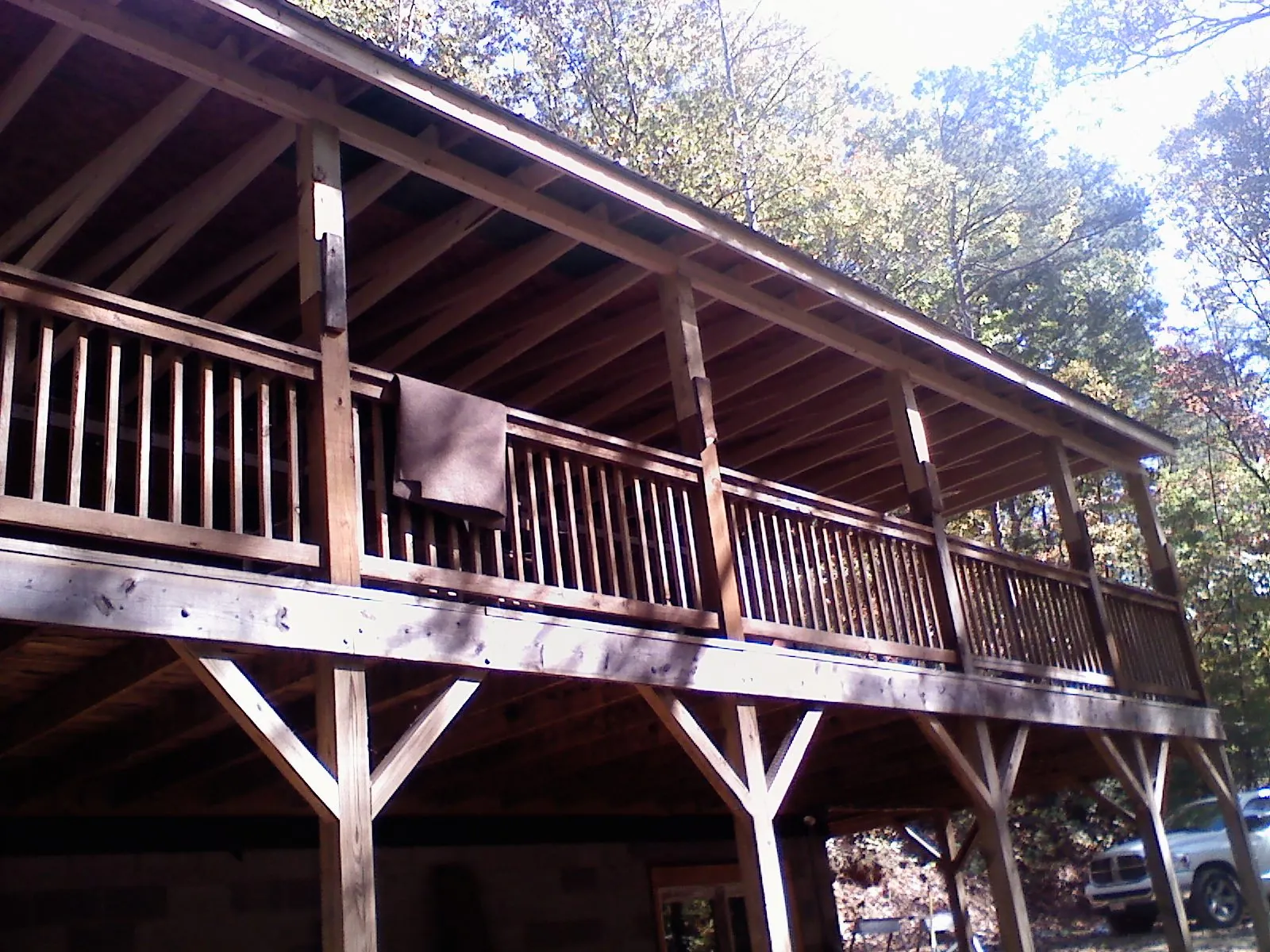 Timber framing under a new elevated porch and deck — Roof Leak Repair in Sharps Chapel by Roofing Brothers